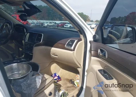 2014 Jeep Grand Cherokee Overland из США, поврежденный, VIN 1C4RJFCT9EC105137